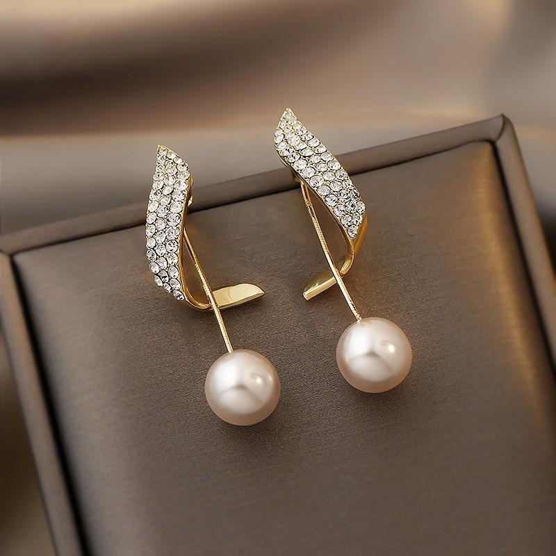 Boucles d'oreilles en or avec éléments scintillants