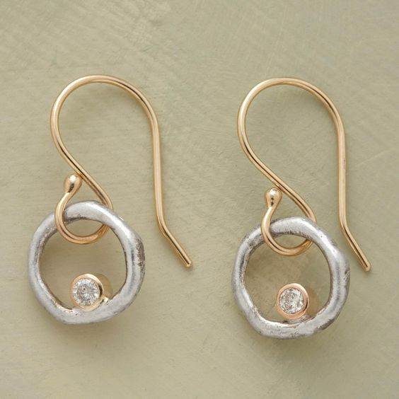 Boucles d'oreilles vintage en finition or et argent avec zirconia
