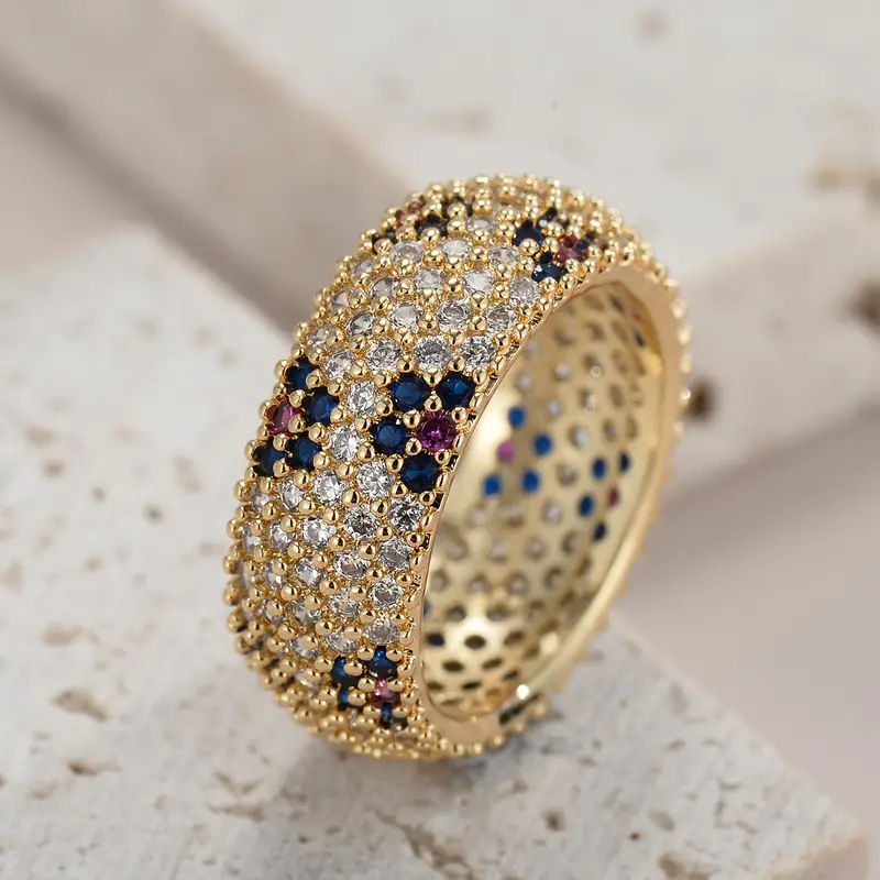 Goldring perforé avec zirconium bleu et violet