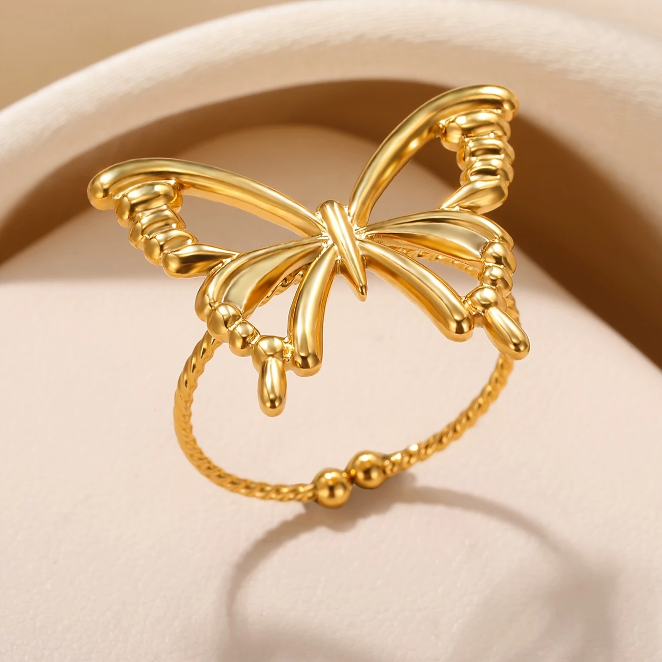 Bague papillon fine dorée