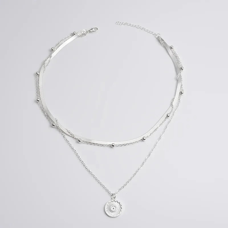 Collier rond à trois couches