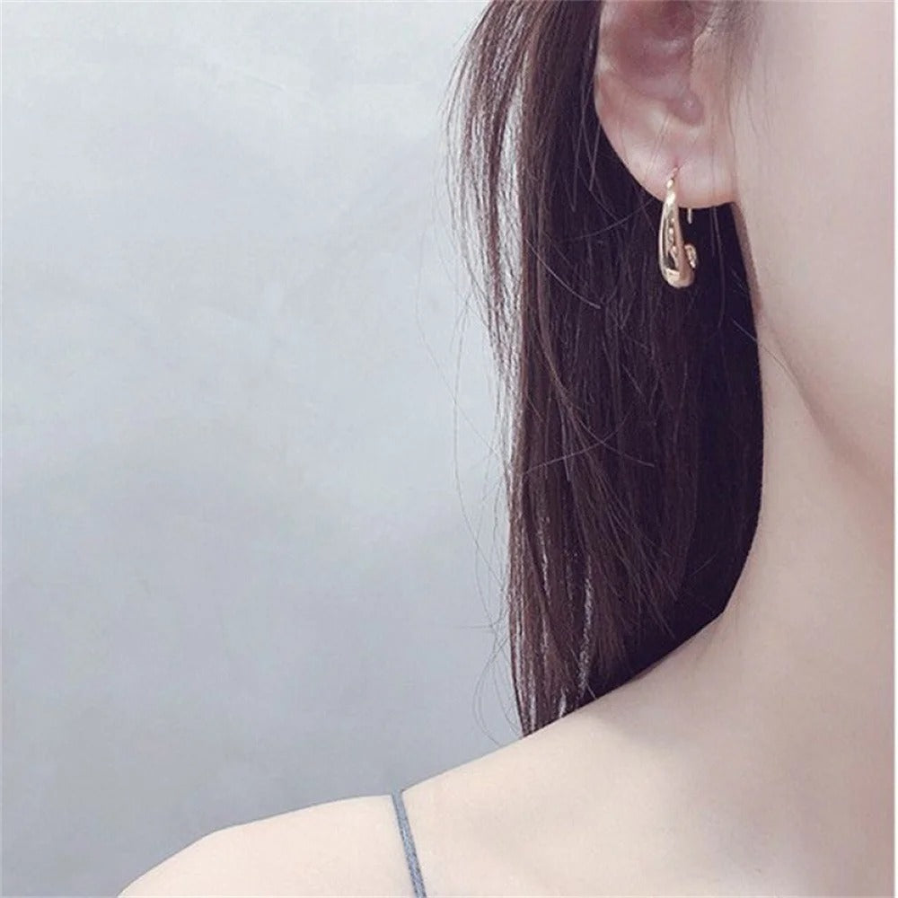 Boucles d’oreilles Cercle C plaquées or 18K