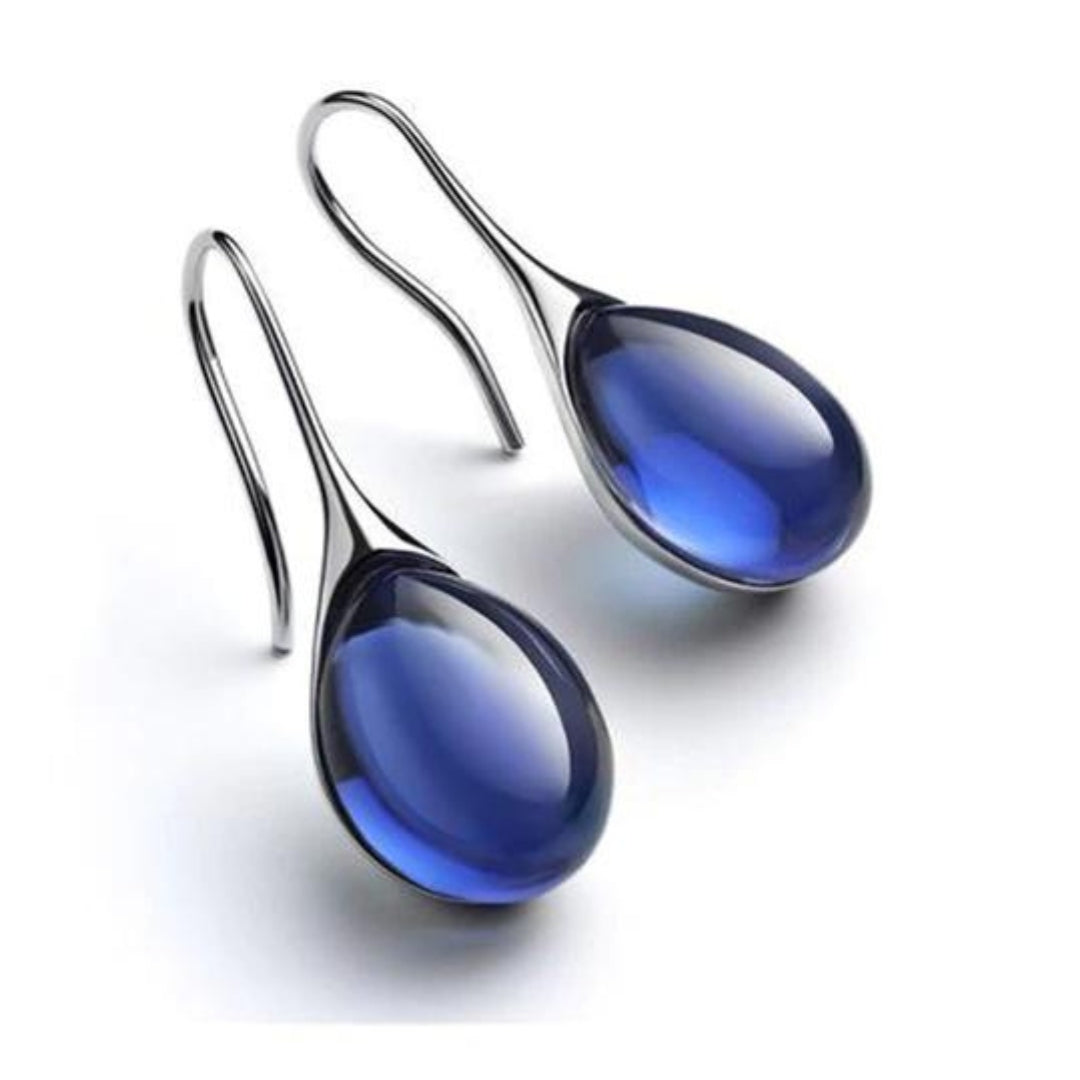 Boucles d’oreilles avec pierre effet cristal dorées et argentées