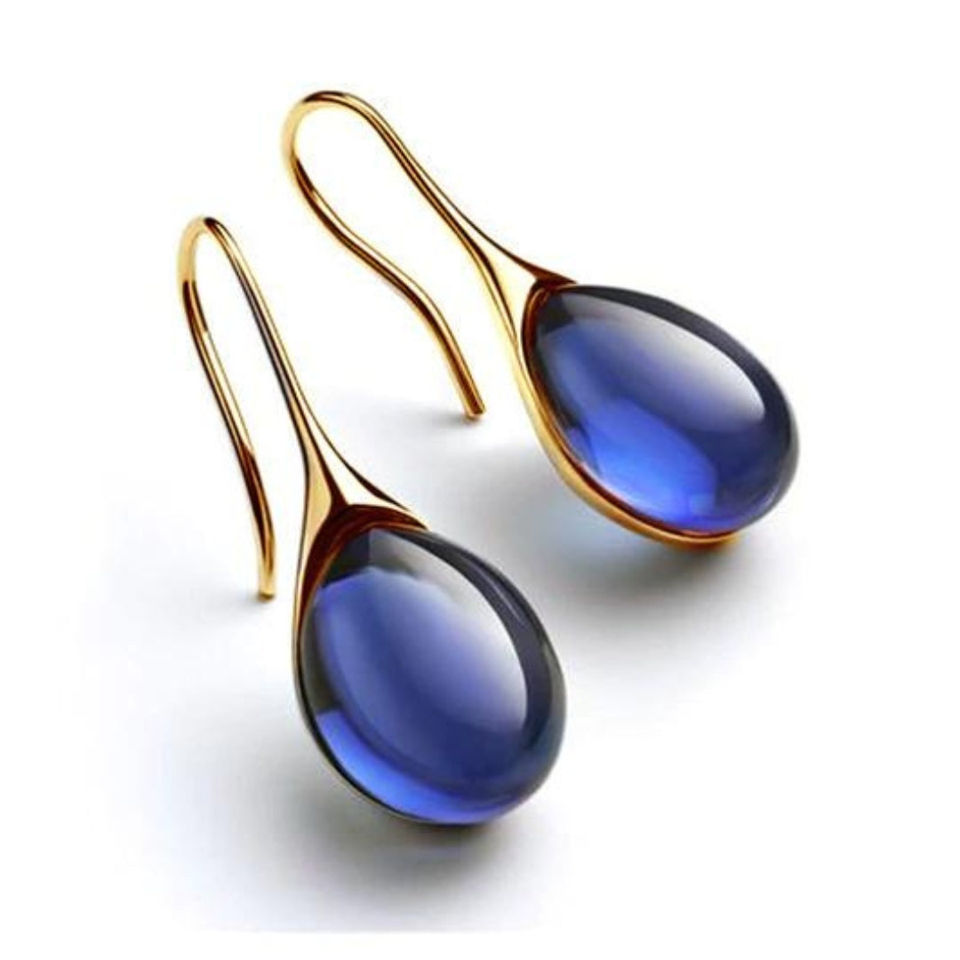 Boucles d’oreilles avec pierre effet cristal dorées et argentées