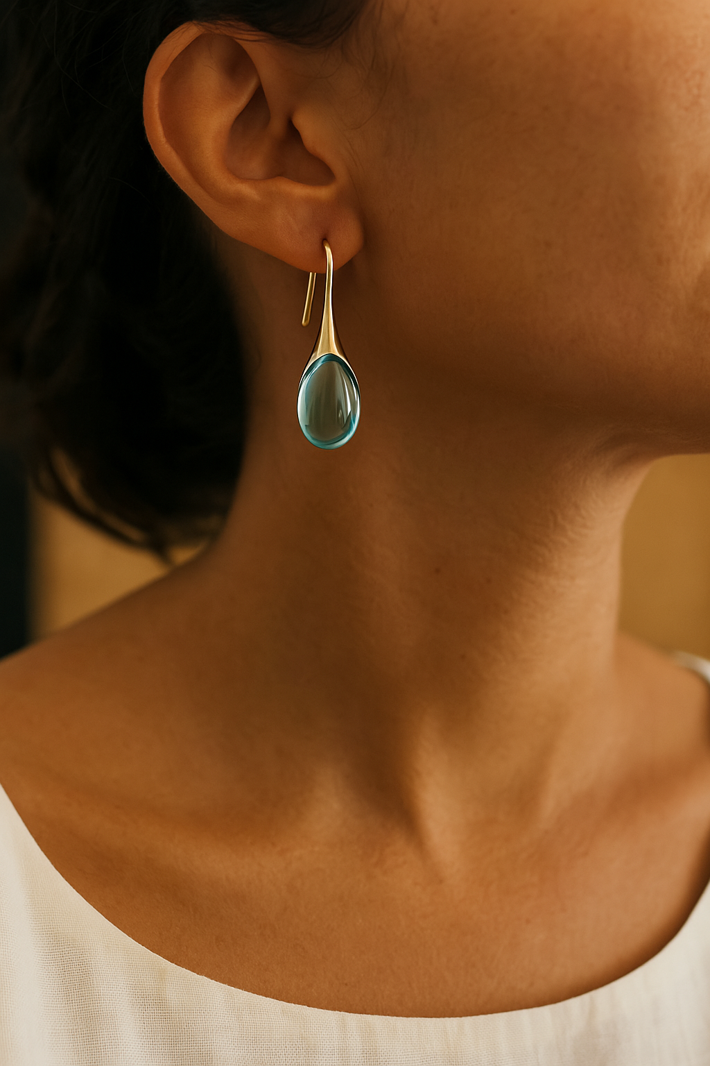 Boucles d’oreilles avec pierre effet cristal dorées et argentées