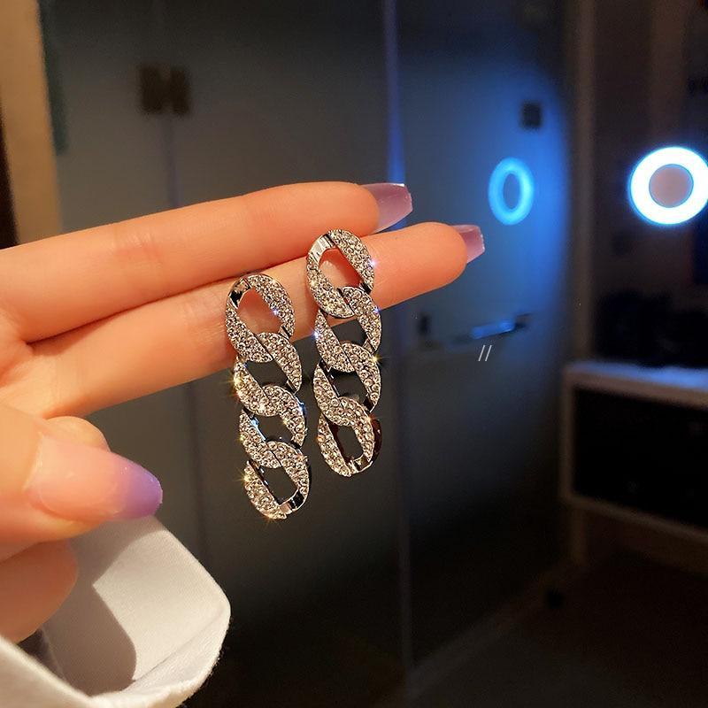 Boucles d'oreilles de luxe avec nœuds en argent et zirconium