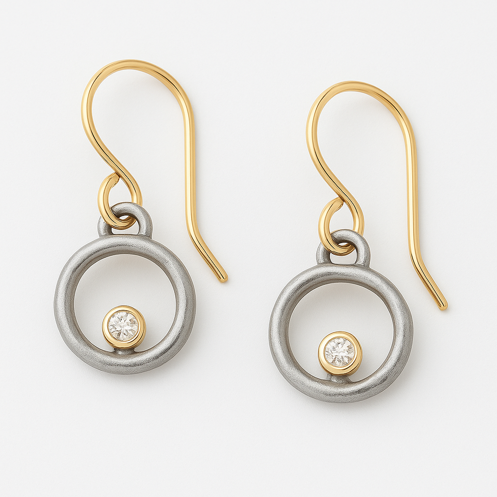 Boucles d'oreilles vintage en finition or et argent avec zirconia