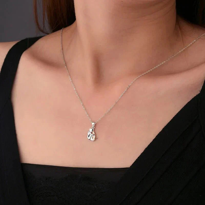 Ametis – Pendentif en forme d'étreinte avec boucles d'oreilles assorties – Uniquement pour une durée limitée