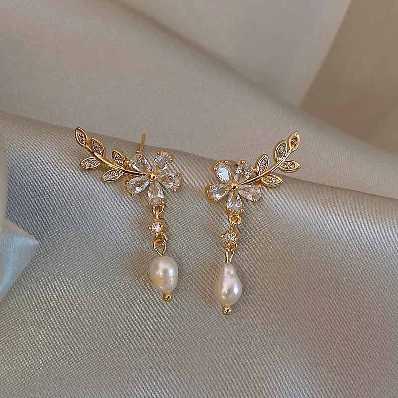 Boucles d'oreilles marguerite effet perles faites à la main