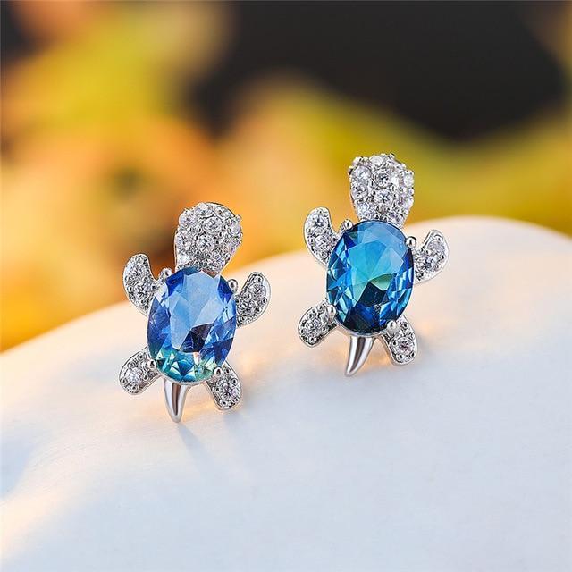 Boucles d'oreilles Tortue de mer en zirconium et finition argent