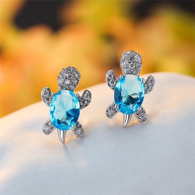 Boucles d'oreilles Tortue de mer en zirconium et finition argent