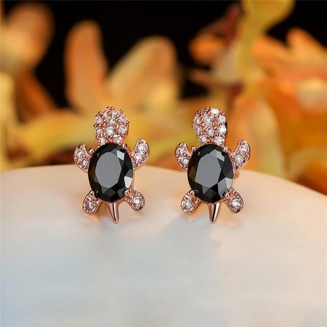 Boucles d'oreilles Tortue de mer en zirconium et finition argent